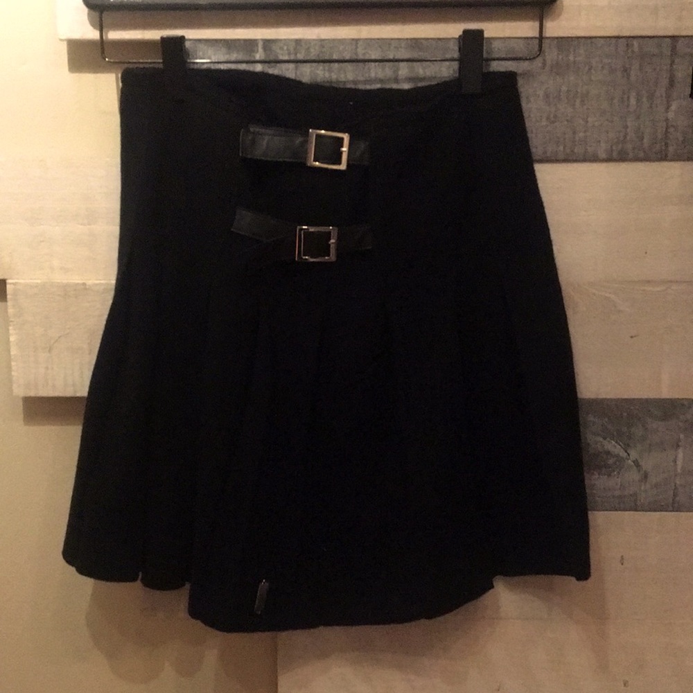 Flowy black skirt with buckle embellishments